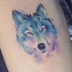 Piccolo tatuaggio colorato Lupo