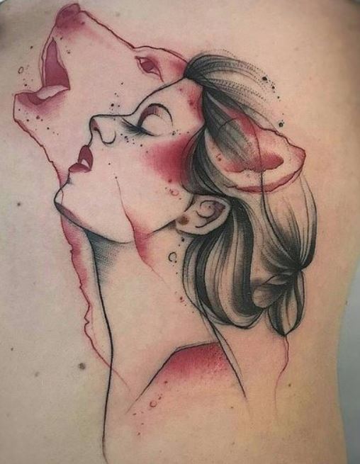 Tatuaggio colorato di un lupo da donna