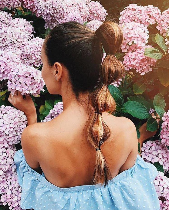 Acconciature da spiaggia con capelli lunghi