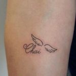 Piccolo Tatuaggio ali di angelo in memoria di un caro defunto