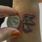Tatuaggio piccolo angelo