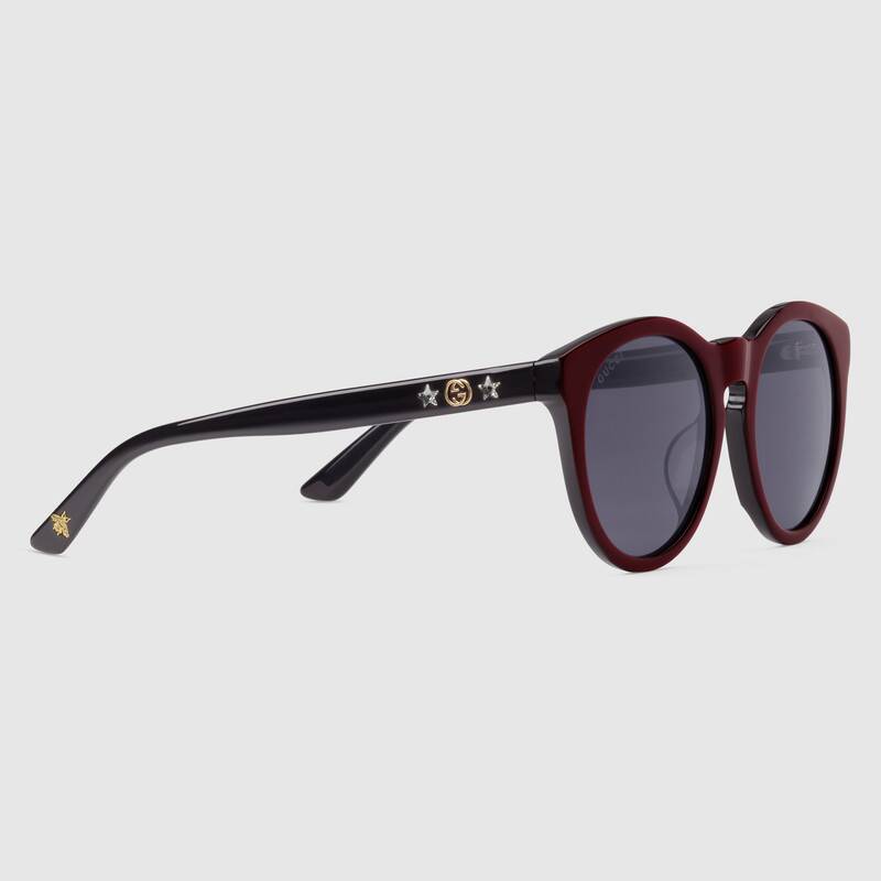 Occhiali da sole rotondi con stellini di cristallo sulle aste Gucci