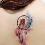 Immagine tatuaggio cattura sogni femminile con gufo