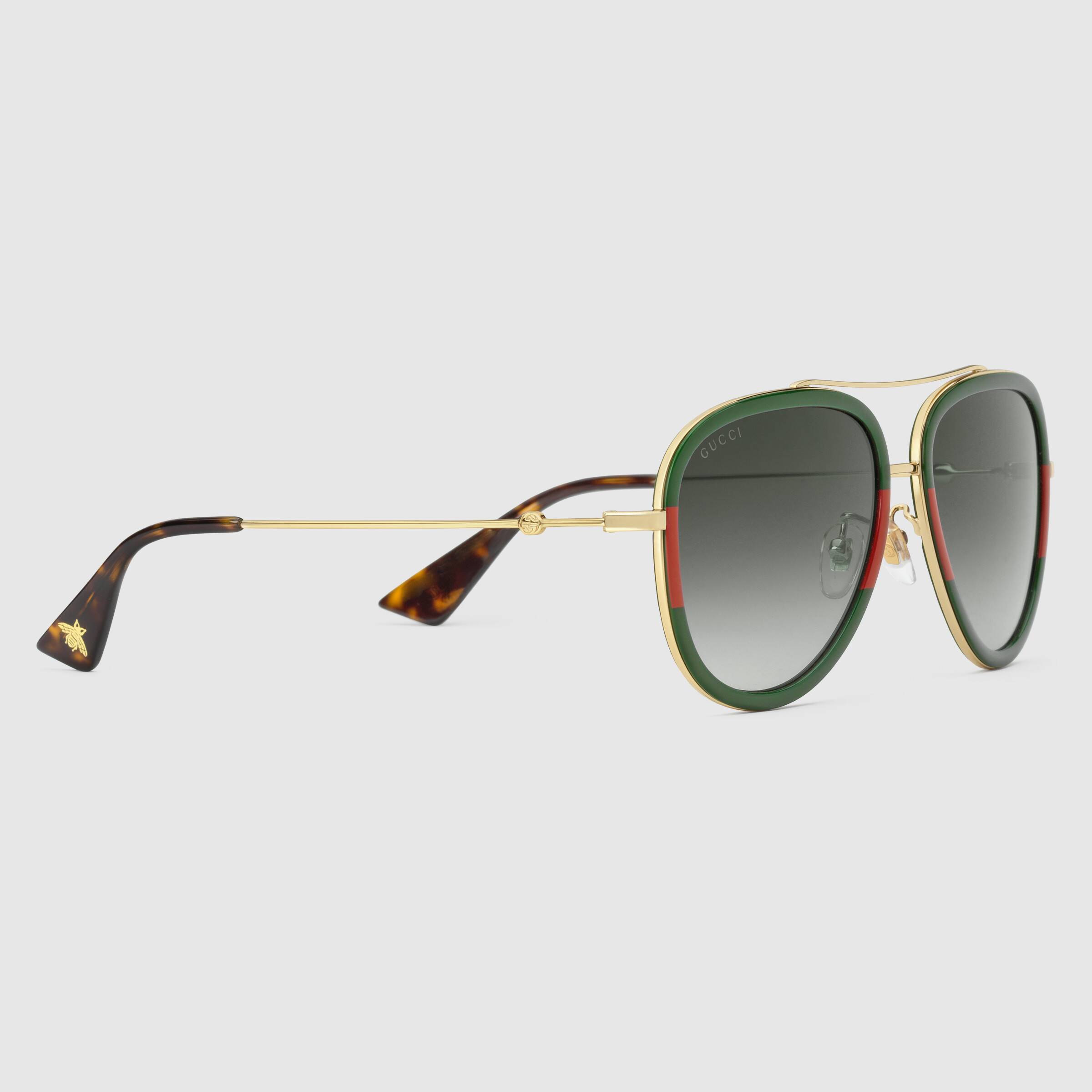 Occhiali da sole Gucci aviator con aste dorate