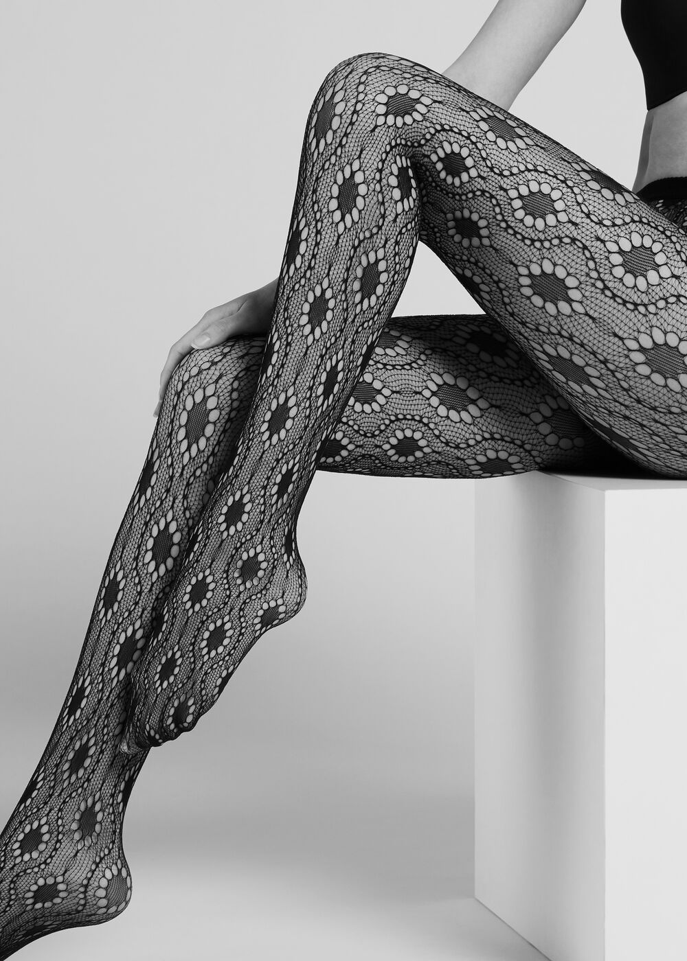 Collant a rete a fantasia floreale