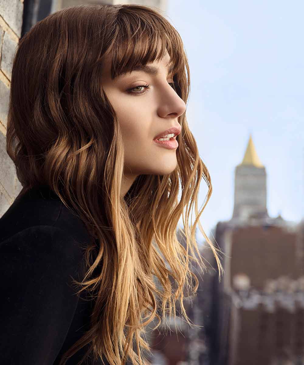 Taglio capelli lunghi con frangia