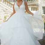 Abito da sposa con vaporosa gonna a balze in tulle ricamato