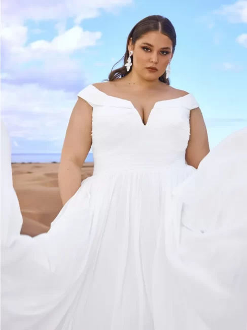 Abito da sposa minimal Pronovias 2023 linea curvy Abito da sposa minimal Pronovias 2023 linea curvy