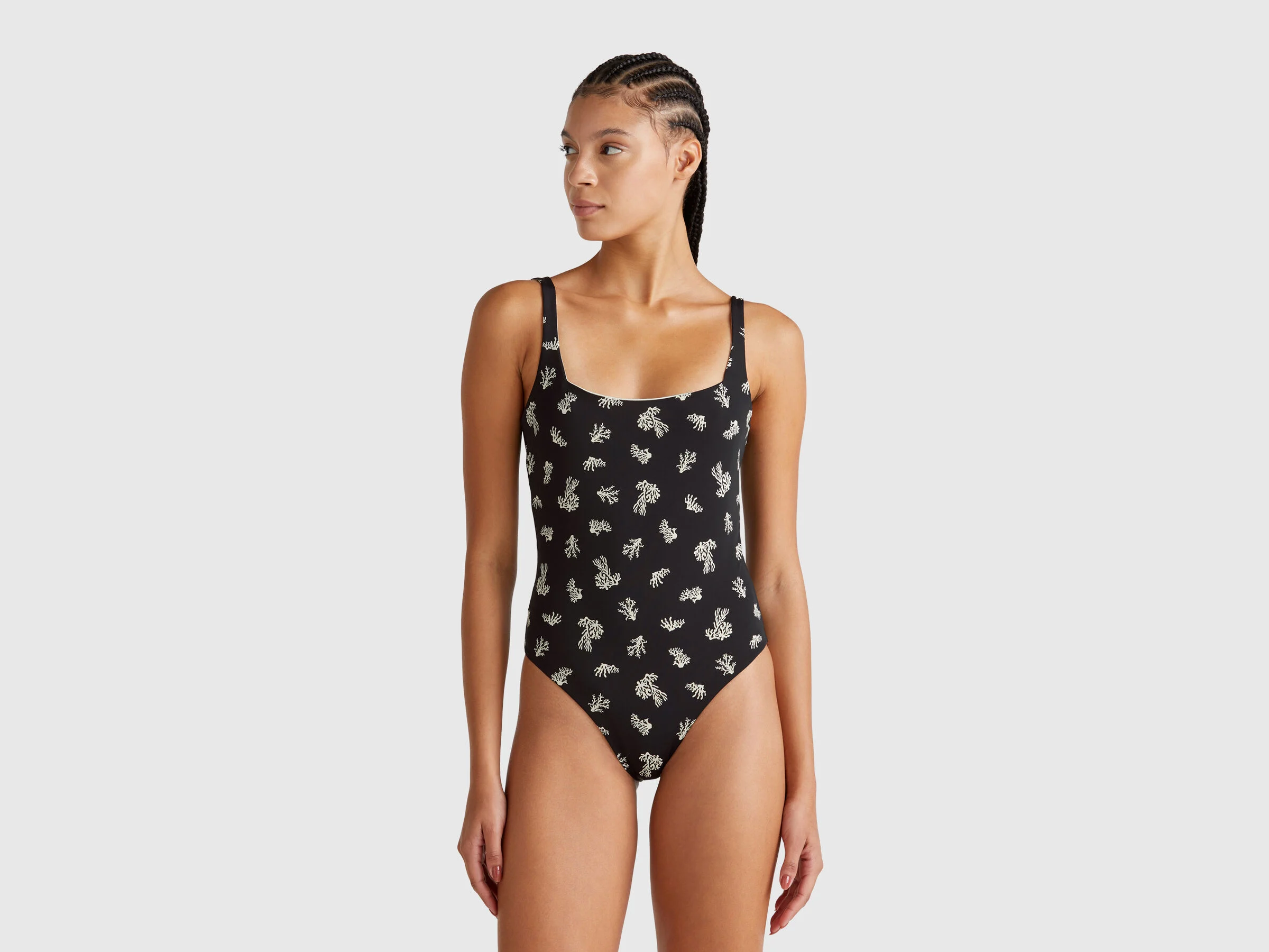 Benetton Costume intero nero con coralli avorio 2025