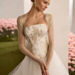 Abito da sposa con decori avorio Rosa Clarà