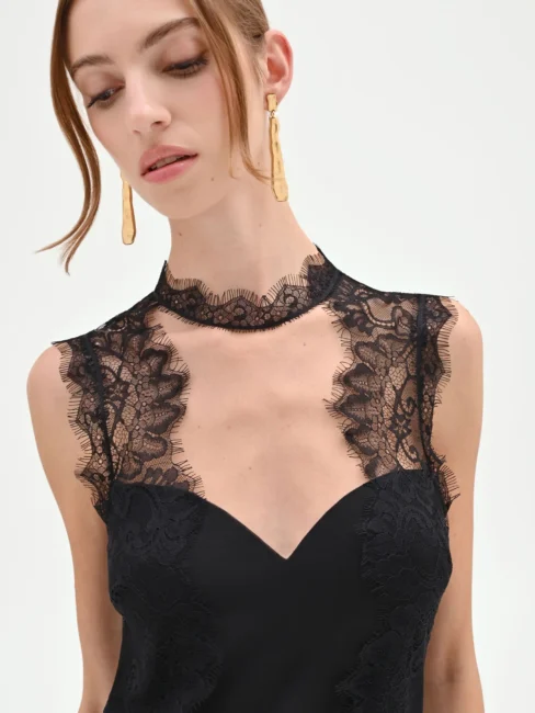 Dettaglio in pizzo corpetto abito elegante